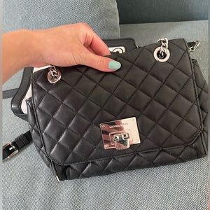 Black quilted Michael Kors shoulder bag with silver hardware